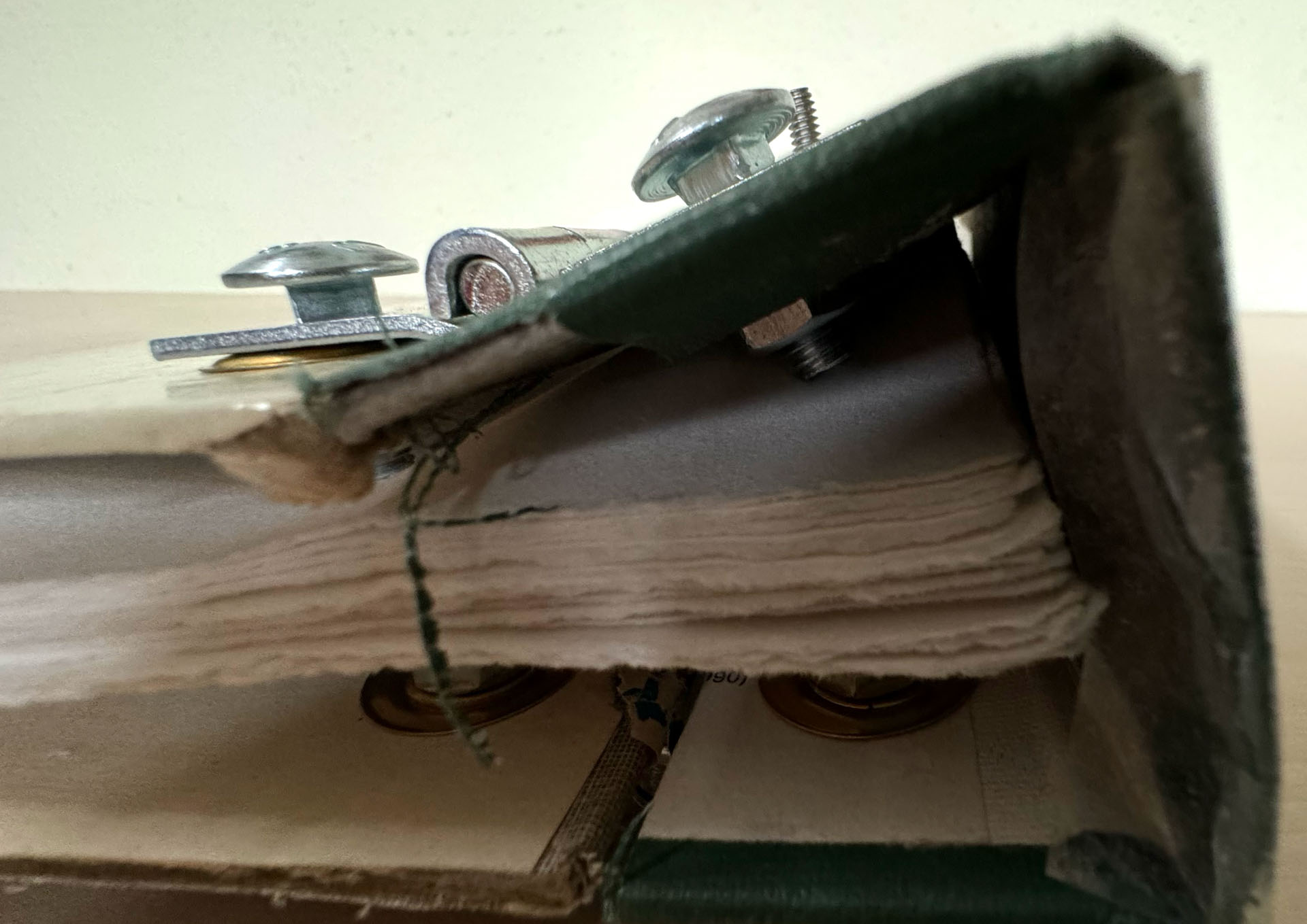 book with hardware binding, copperplate etching, mixed-media collage
