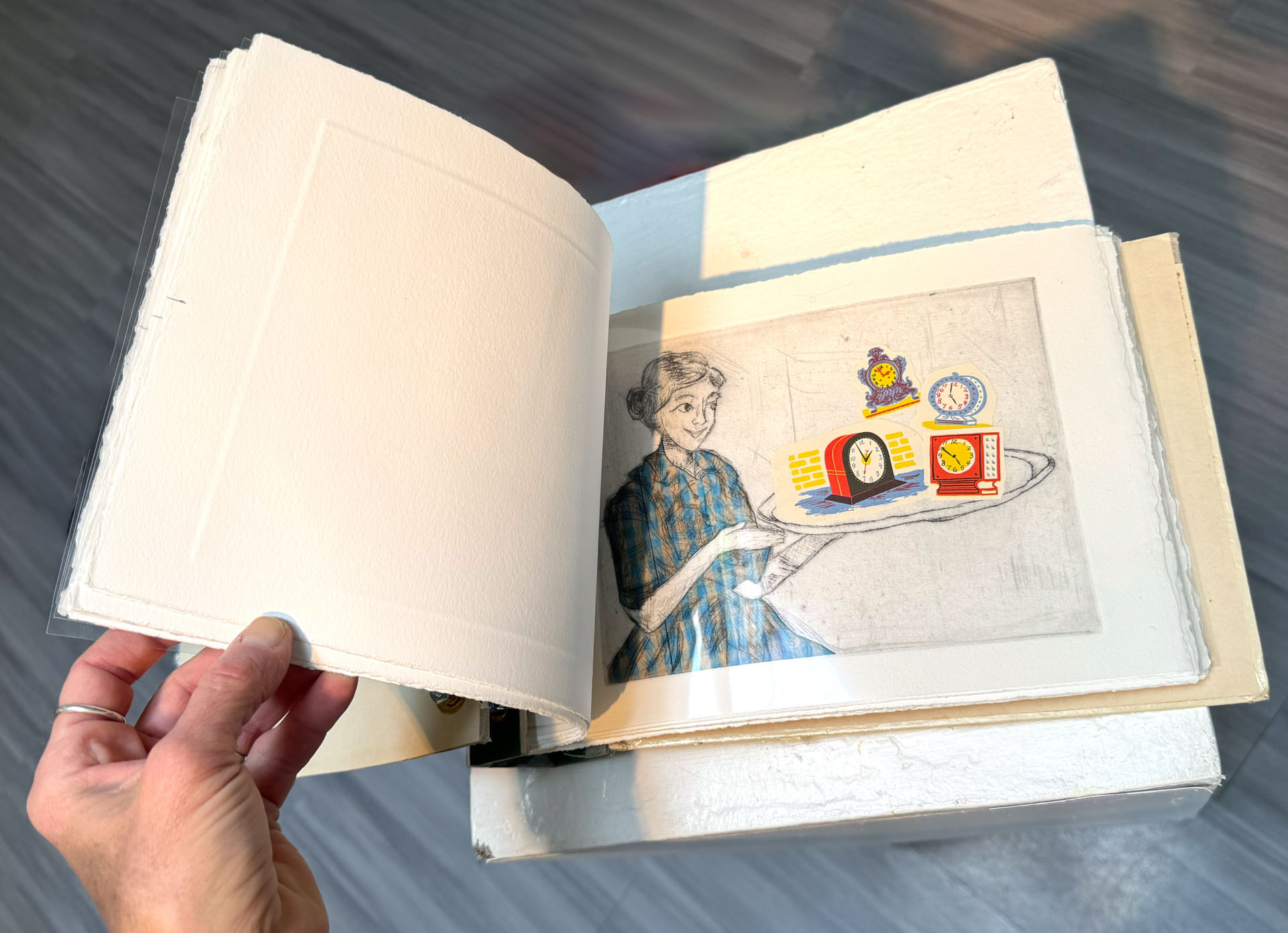 book with hardware binding, copperplate etching, mixed-media collage