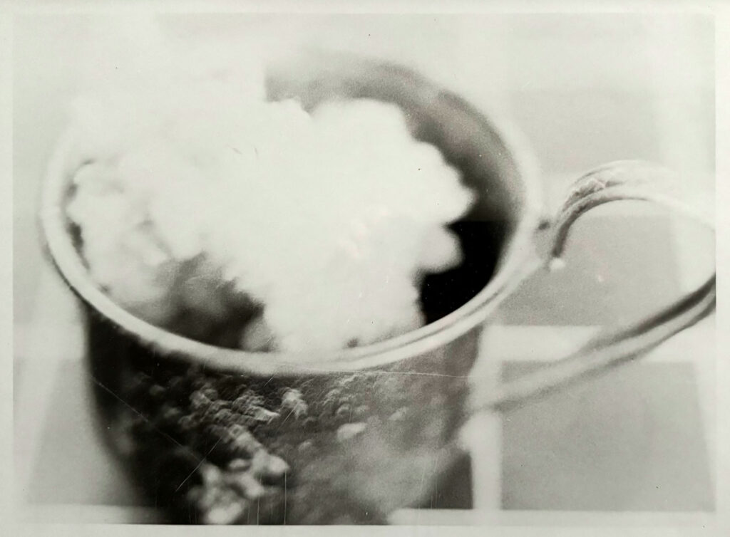 black & white gelatin silver print photograph of vessels with fabric inside