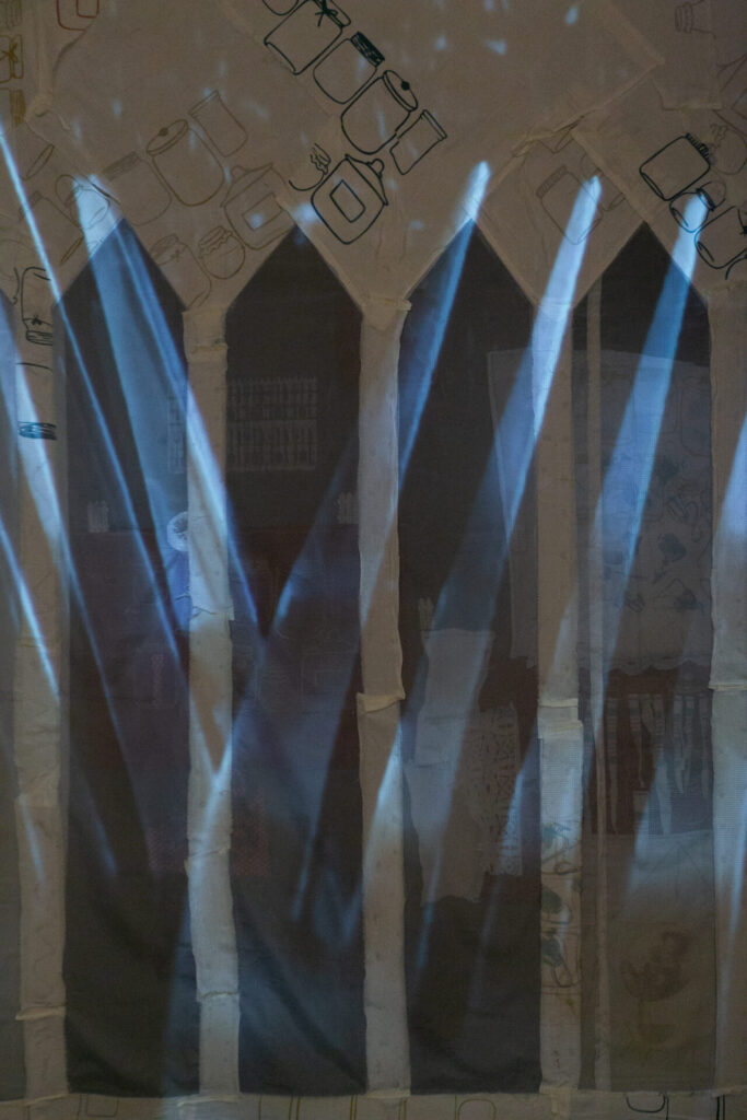video installation with textile, silkscreen, monotype, sewing, collage, large nails, twine
